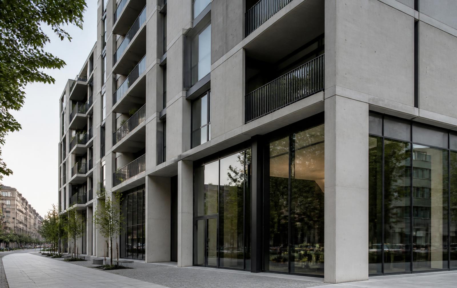Concrete and glass residential building on a quiet city street